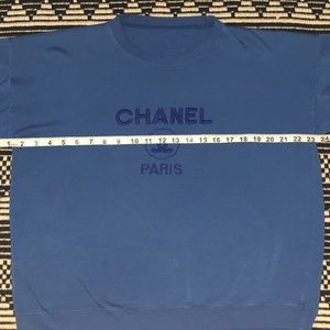Bootleg Chanel crew sweater.